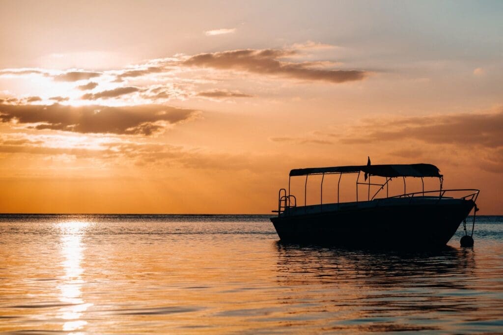 a boat during sunset